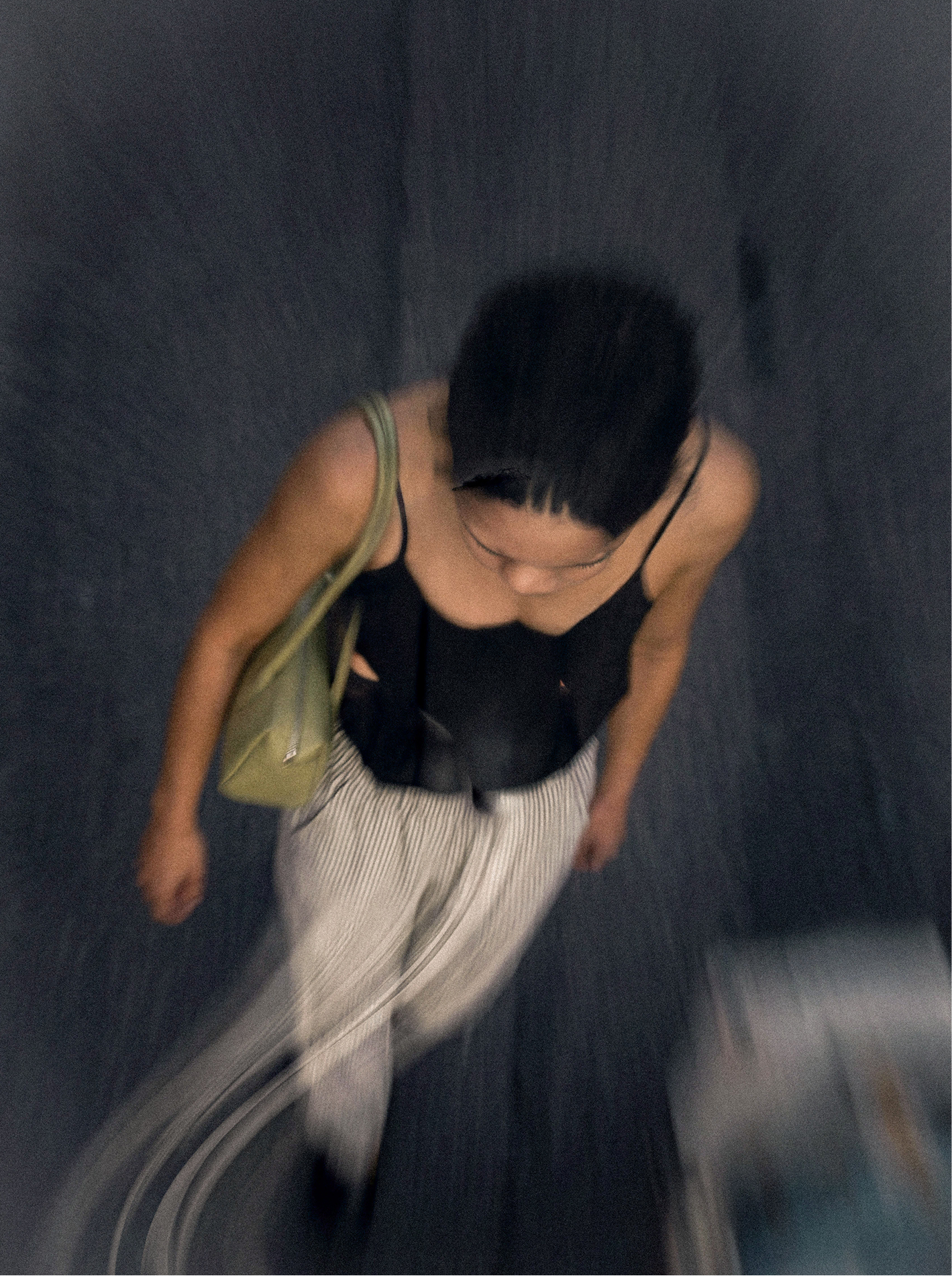 Motion-blurred figure in monochrome